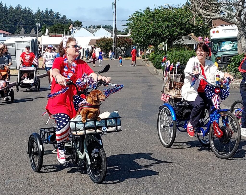 Festive red, white, and blue bikes in the parade in Old Town Florence