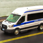 Friends of Florence white bus with blue stripe